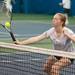 Anna Borowicz of Pioneer girls tennis team retunes the ball  during practice Thursday night.
Courtney Sacco I AnnArbor.com 